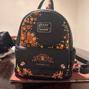 Loungefly Black Backpack with Orange and Yellow Floral Accents